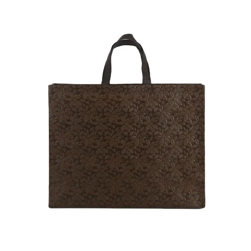 Brown patterned laminated tote with black carry handles